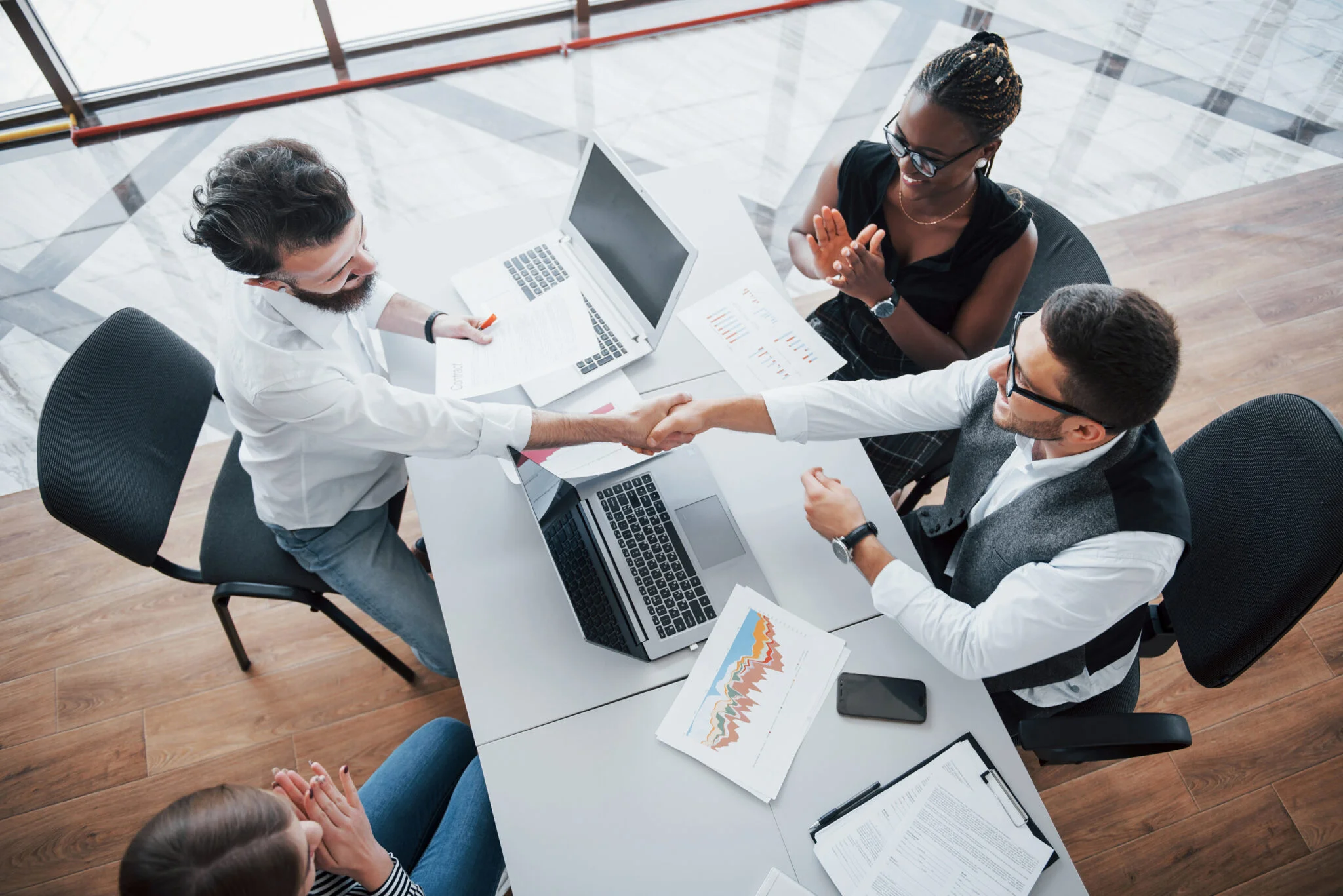 young employees sitting office table using laptop team work brainstorming meeting concept 2048x1367 1